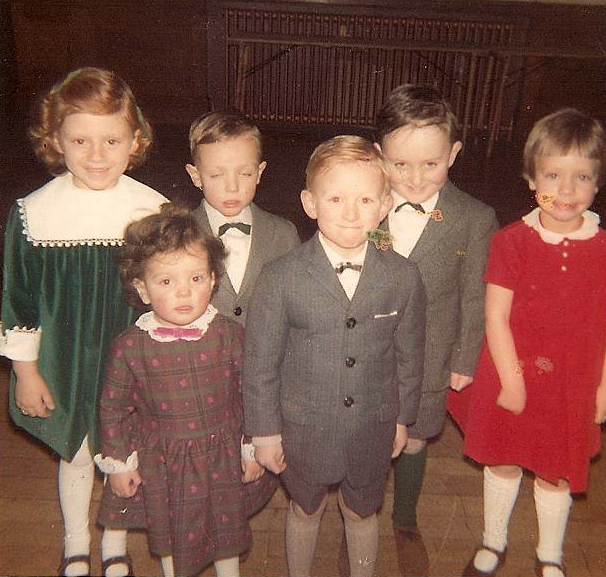 Alex on the right in the red dress